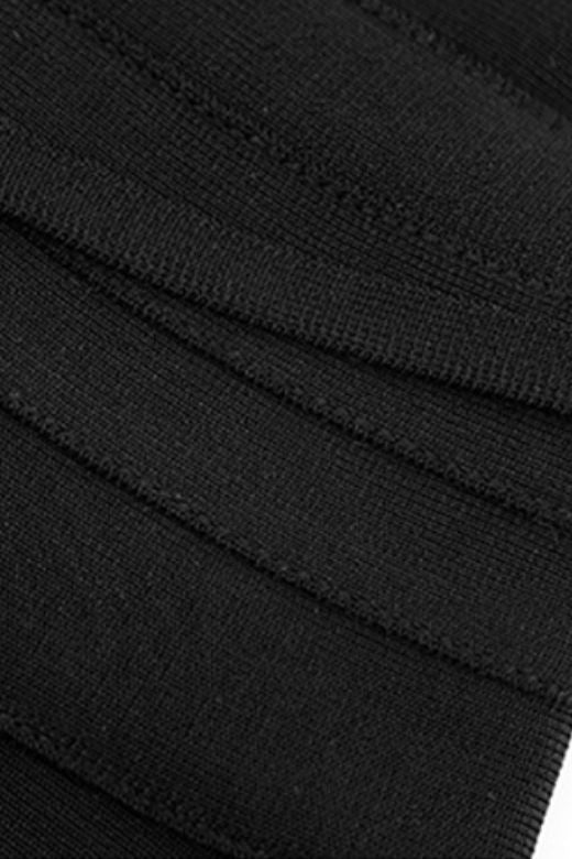 Woman wearing a figure flattering Eve Bandage Pants Jumpsuit - Classic Black Bodycon Collection