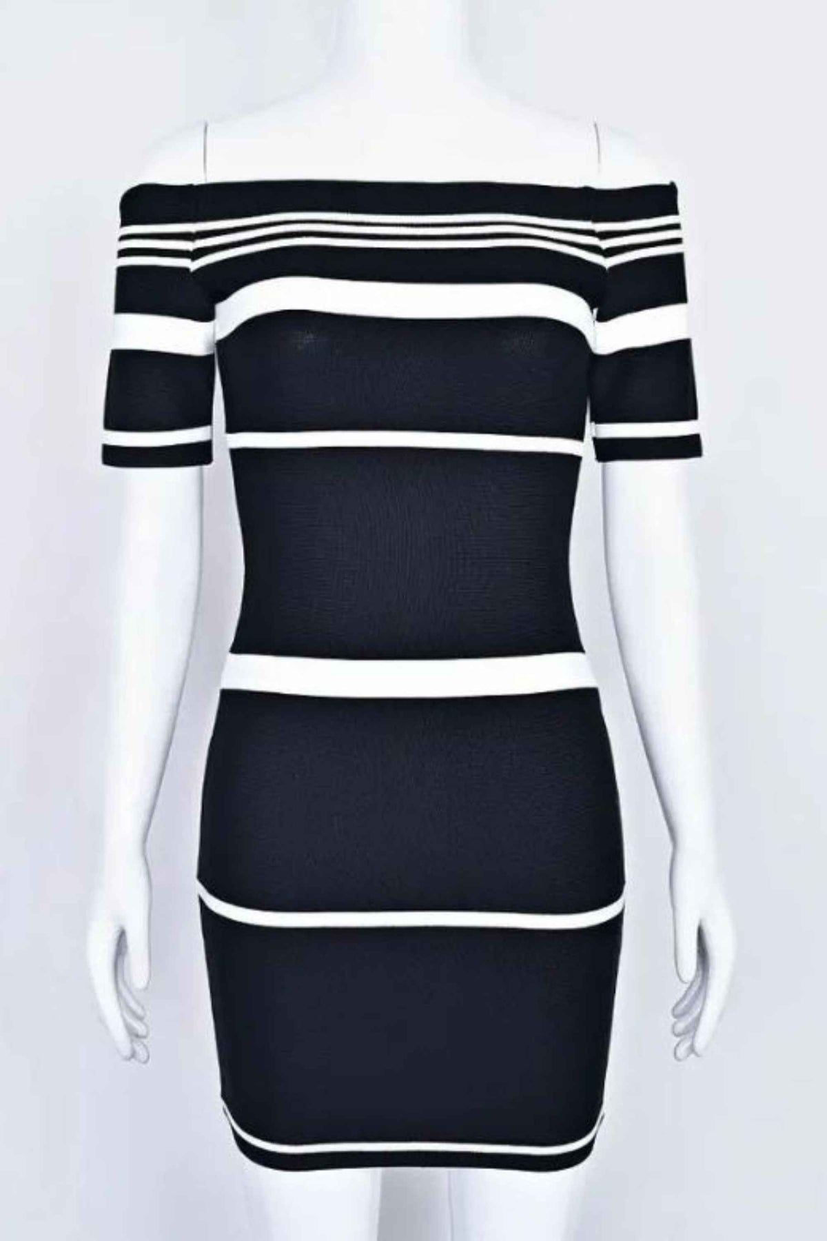 Woman wearing a figure flattering Evelyn Bandage Mini Dress - Classic Black BODYCON COLLECTION Pty Ltd