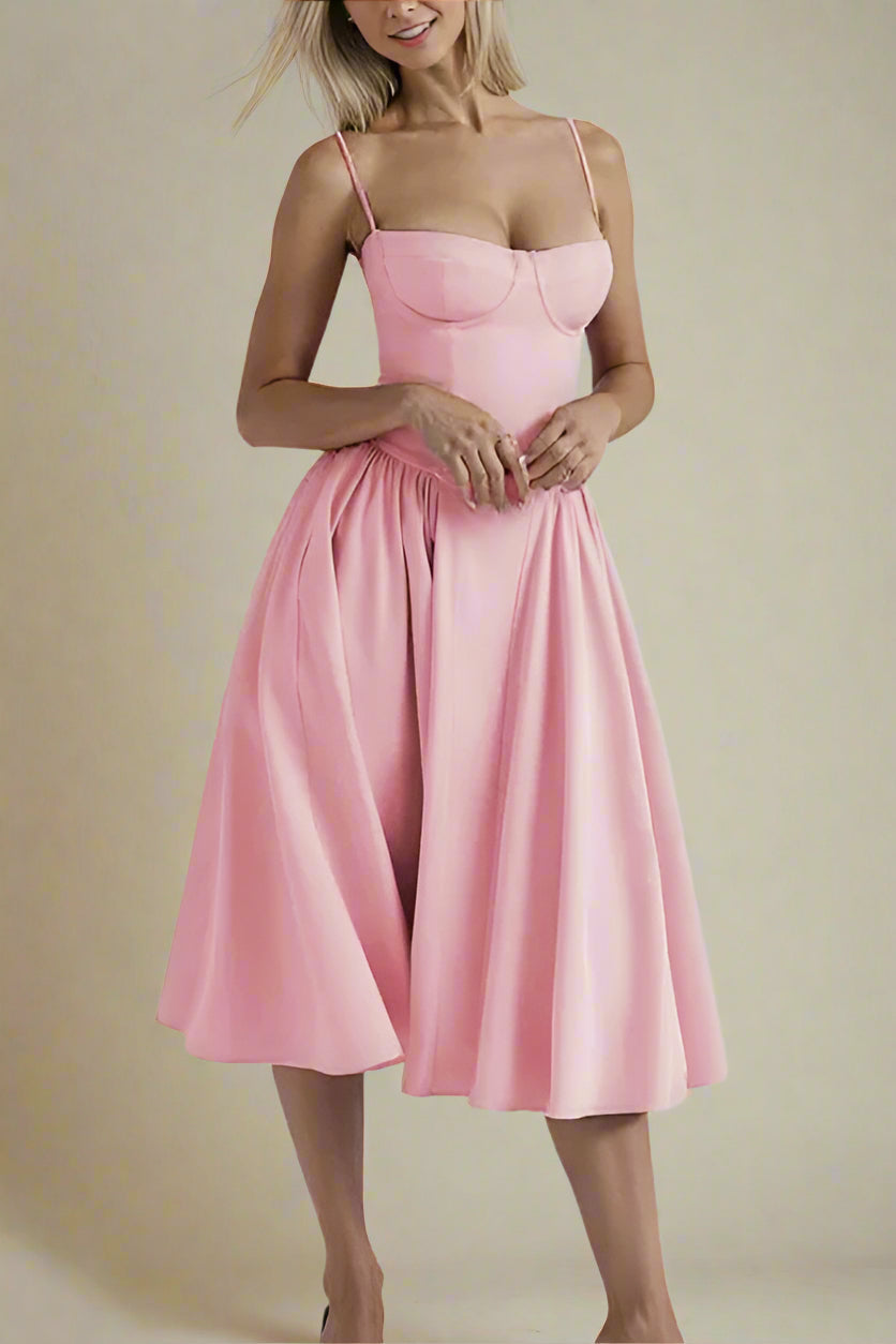 Woman wearing a figure flattering Everly Bodycon Day Midi Dress - Blush Pink BODYCON COLLECTION