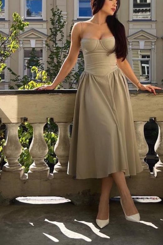 Woman wearing a figure flattering Everly Bodycon Day Midi Dress - Dusty Pink BODYCON COLLECTION