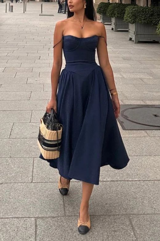 Woman wearing a figure flattering Everly Bodycon Day Midi Dress - Navy Blue BODYCON COLLECTION