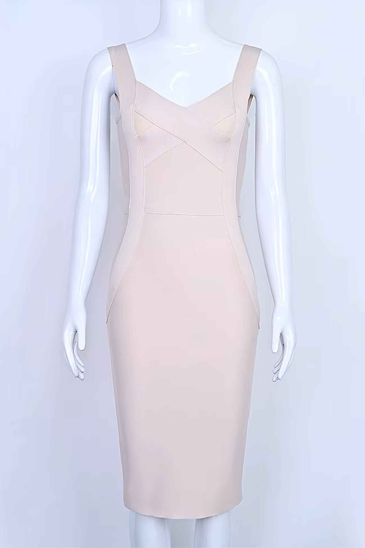 Woman wearing a figure flattering Freya Bandage Dress - Beige BODYCON COLLECTION
