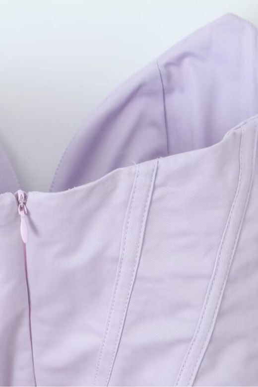 Woman wearing a figure flattering Gabbi Bodycon Midi Dress - Lavender Purple BODYCON COLLECTION