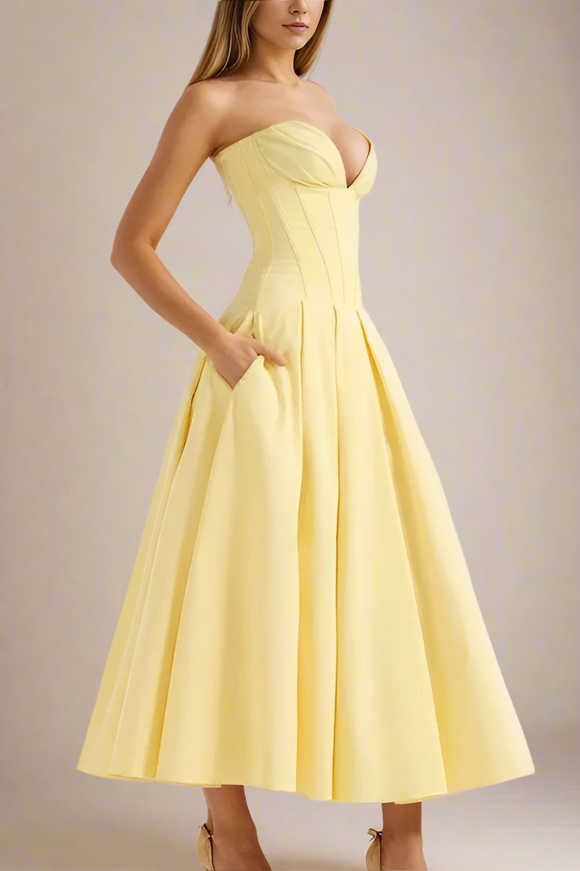 Woman wearing a figure flattering Gabbi Bodycon Midi Dress - Sun Yellow BODYCON COLLECTION