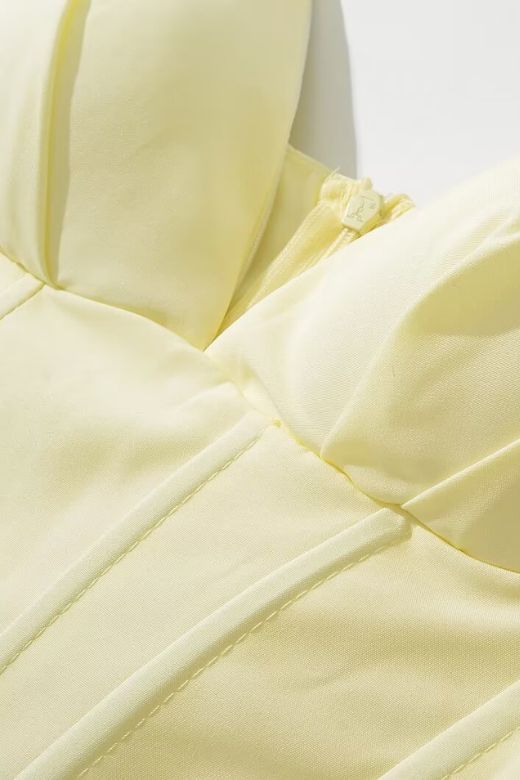 Woman wearing a figure flattering Gabbi Bodycon Midi Dress - Sun Yellow BODYCON COLLECTION