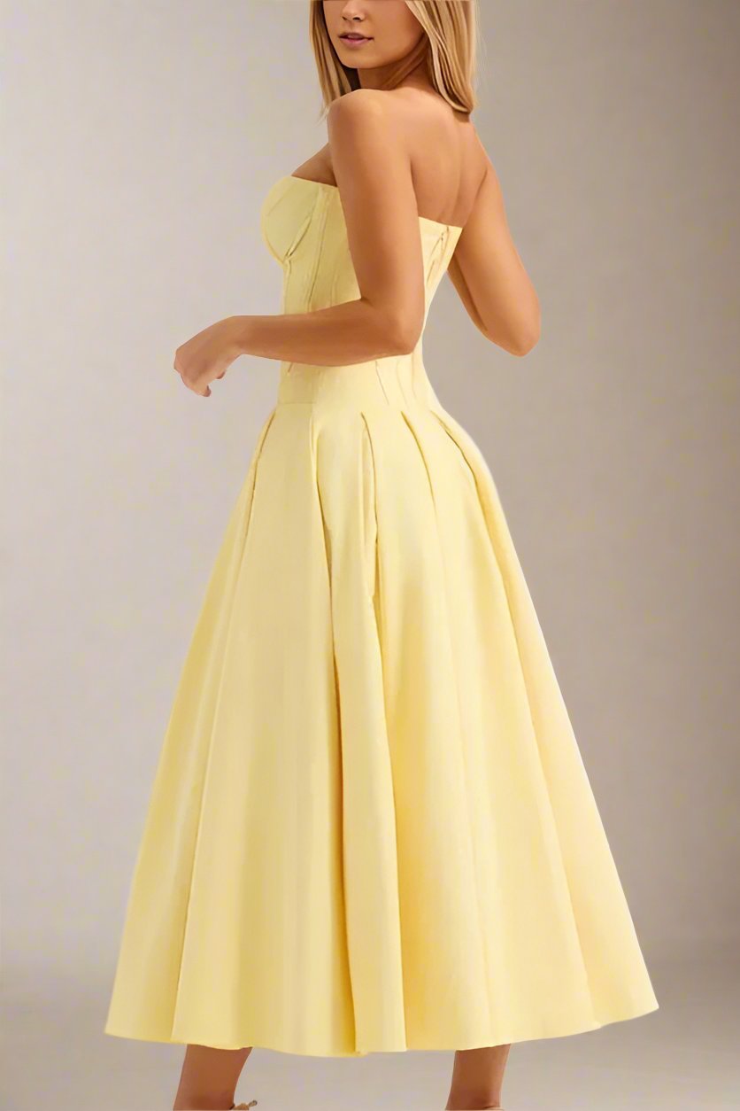 Woman wearing a figure flattering Gabbi Bodycon Midi Dress - Sun Yellow BODYCON COLLECTION