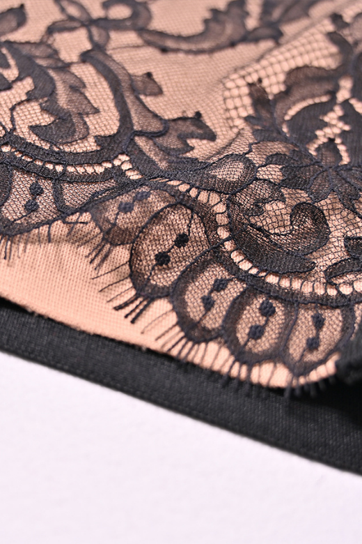 Woman wearing a figure flattering Genevieve Bodycon Lace Midi Dress - Classic Black BODYCON COLLECTION