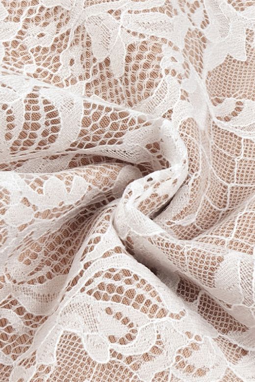 Woman wearing a figure flattering Genevieve Bodycon Lace Midi Dress - Pearl White BODYCON COLLECTION