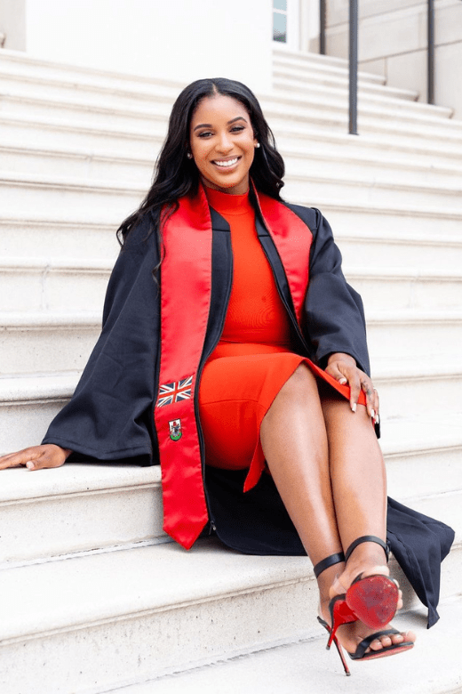 Woman wearing a figure flattering Grace Bandage Midi Dress - Navy Blue Bodycon Collection