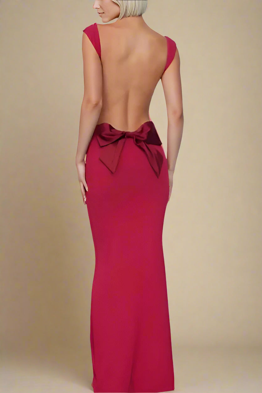 Woman wearing a figure flattering Harper Bodycon Maxi Dress - Lipstick Red BODYCON COLLECTION
