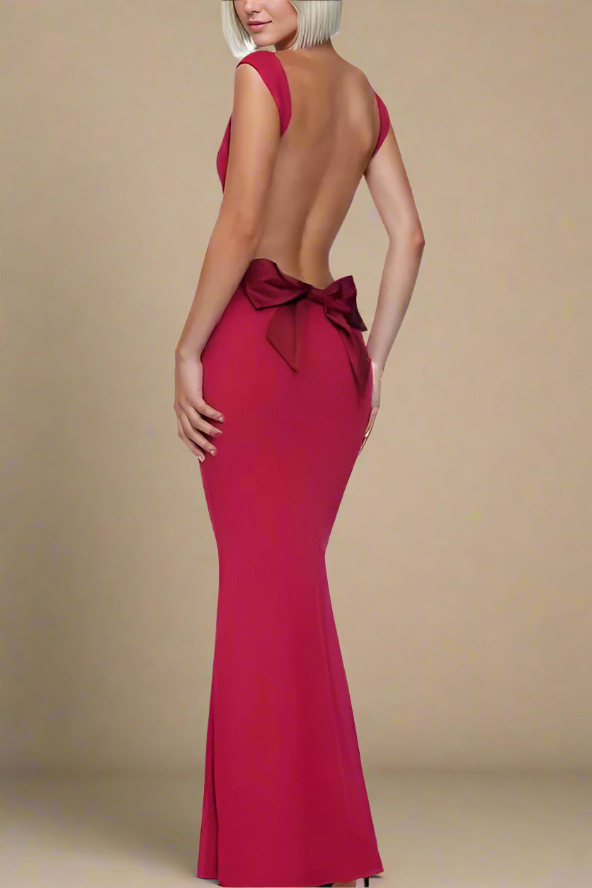 Woman wearing a figure flattering Harper Bodycon Maxi Dress - Lipstick Red BODYCON COLLECTION