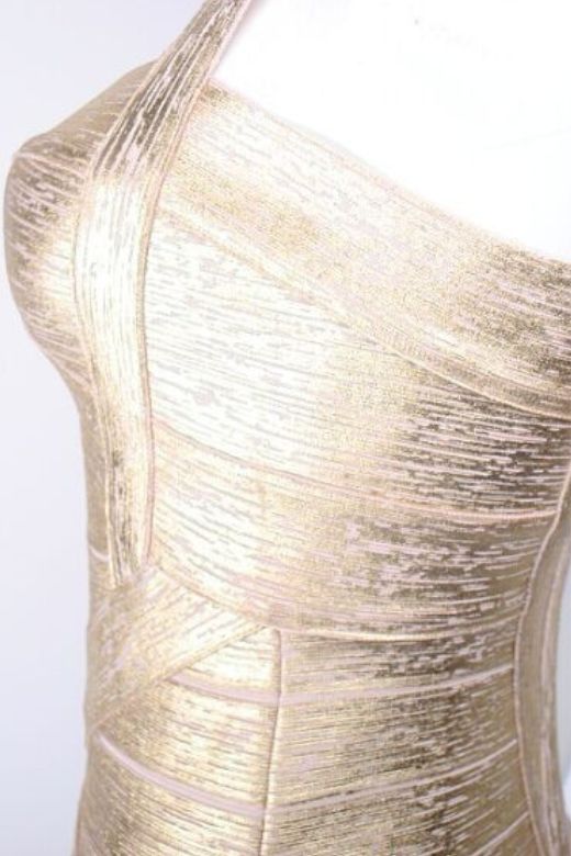 Woman wearing a figure flattering Heidi Bandage Midi Dress - Gold BODYCON COLLECTION