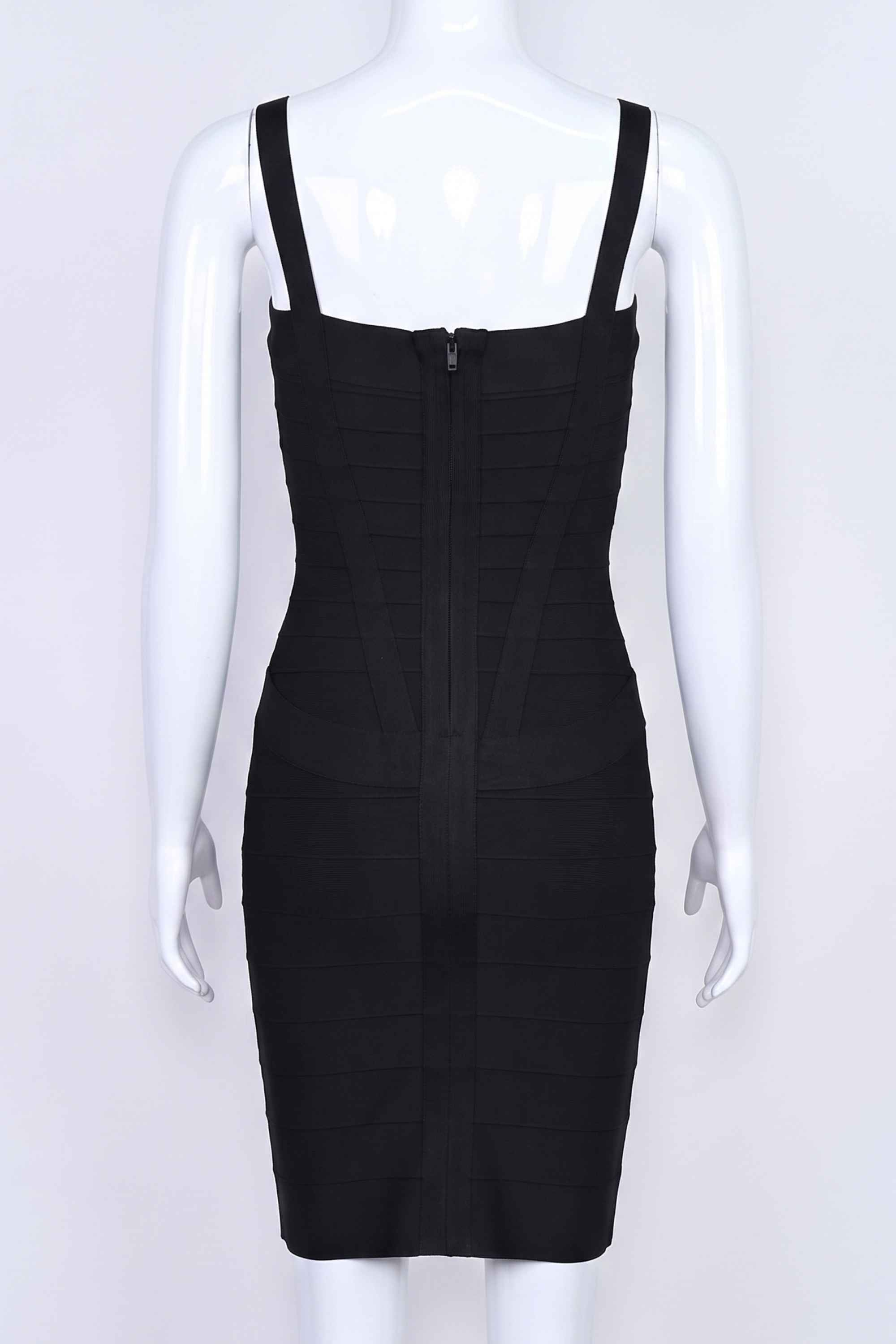 Woman wearing a figure flattering Heidi Bandage Mini Dress - Classic Black Bodycon Collection