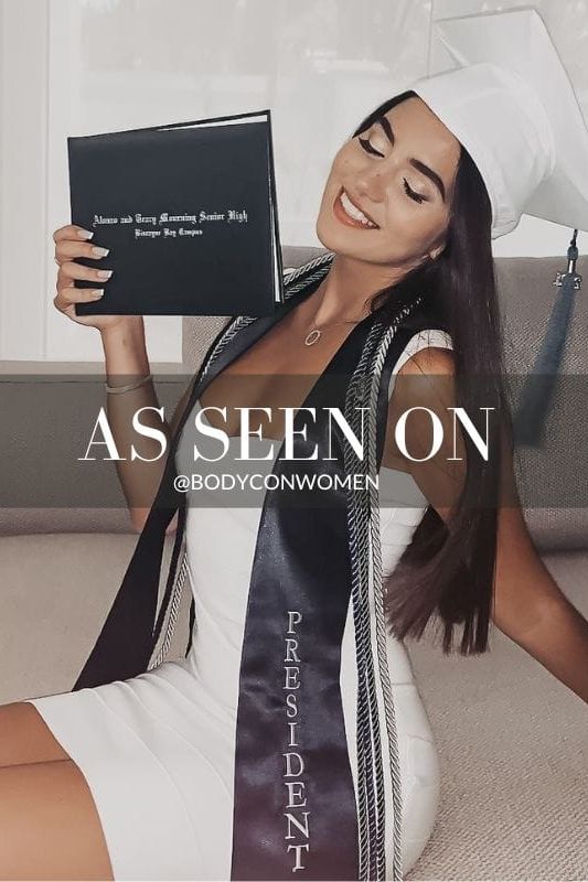 Woman wearing a figure flattering Heidi Bandage Mini Dress - Pearl White Bodycon Collection