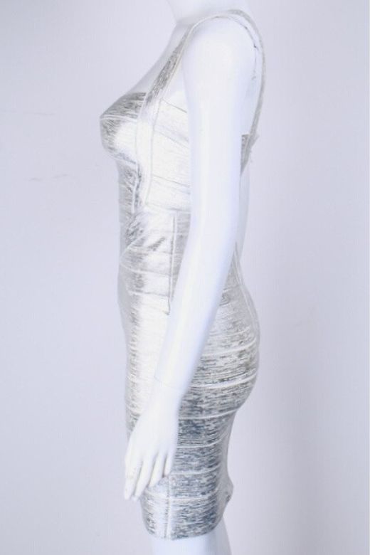 Woman wearing a figure flattering Heidi Bandage Mini Dress - Silver Bodycon Collection