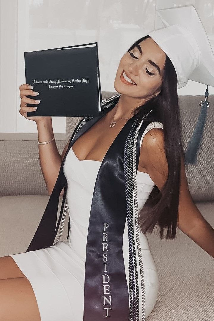 Woman wearing a figure flattering Heidi Bandage Mini Dress - Sun Yellow Bodycon Collection