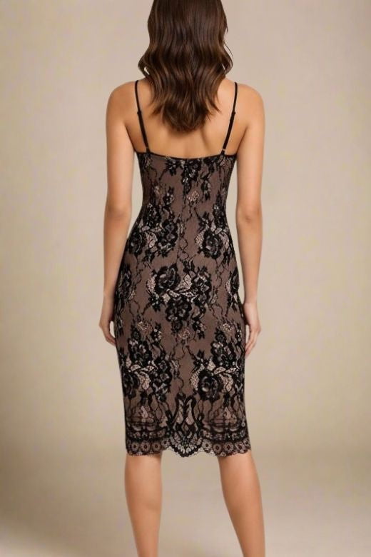 Woman wearing a figure flattering Joan Bodycon Dress - Classic Black BODYCON COLLECTION