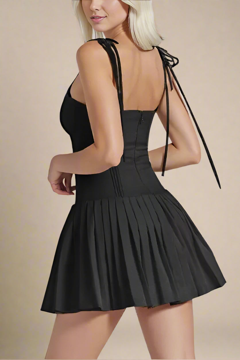 Woman wearing a figure flattering Vivien Bodycon Mini Dress - Classic Black BODYCON COLLECTION