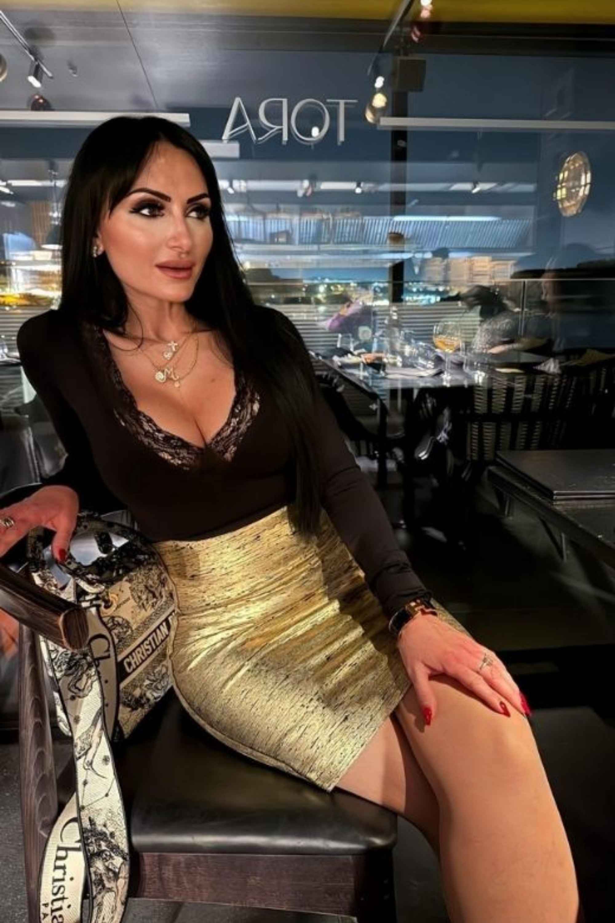 Woman wearing a figure flattering High Waist Leather Pencil Skirt Mini Length - Gold BODYCON COLLECTION