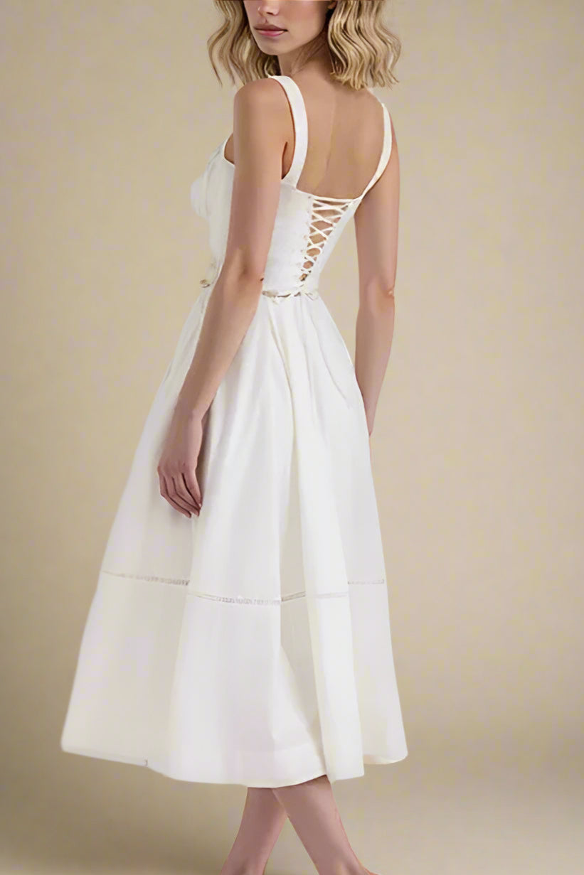 Woman wearing a figure flattering Holland Top and Midi Skirt Set - White Pearl BODYCON COLLECTION Pty Ltd