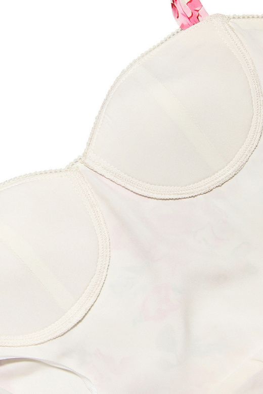 Woman wearing a figure flattering Imogen Bodycon Day Midi Dress - Dusty Pink BODYCON COLLECTION