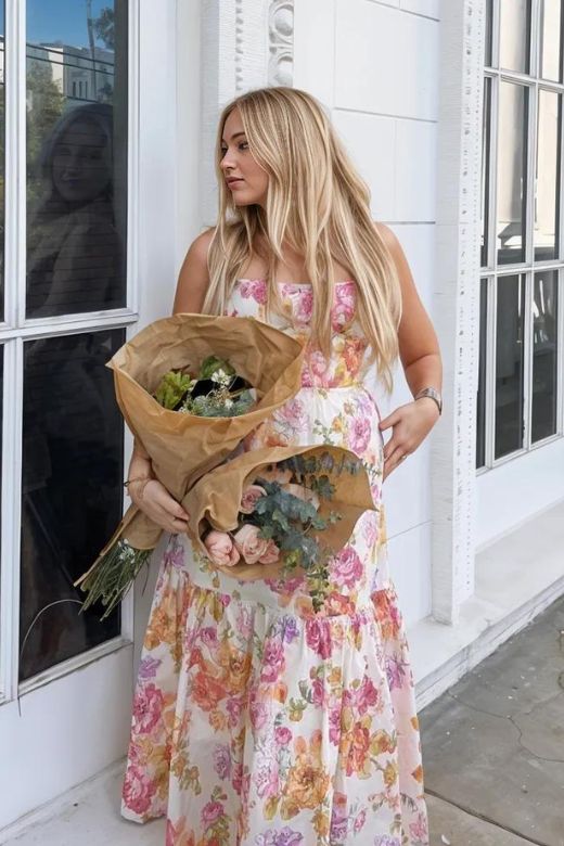 Woman wearing a figure flattering Imogen Bodycon Day Midi Dress - Peach BODYCON COLLECTION