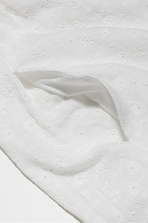 Woman wearing a figure flattering Imogen Bodycon Day Midi Dress - Pearl White BODYCON COLLECTION