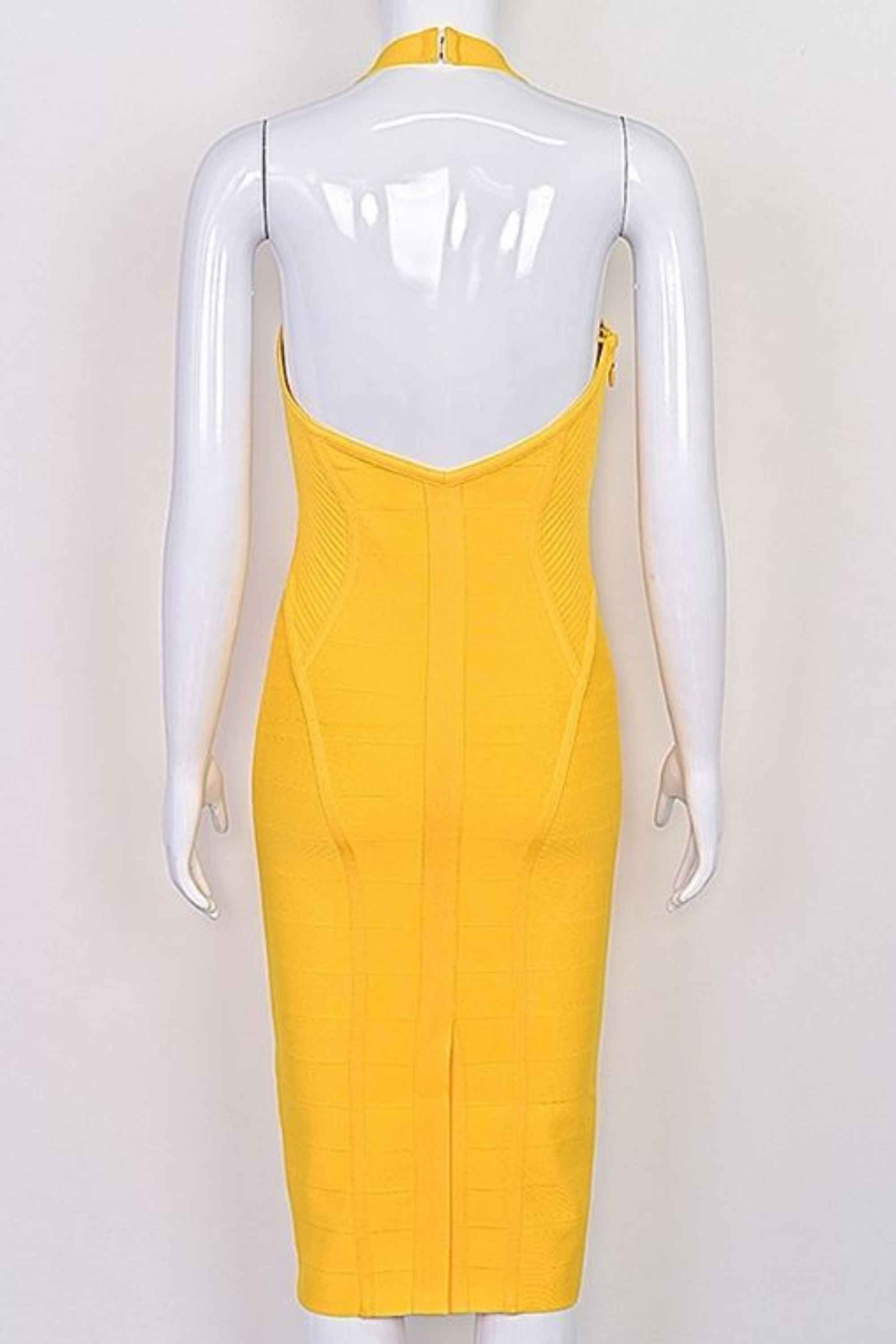 Woman wearing a figure flattering Isabella Bandage Midi Dress - Mustard Yellow BODYCON COLLECTION Pty Ltd