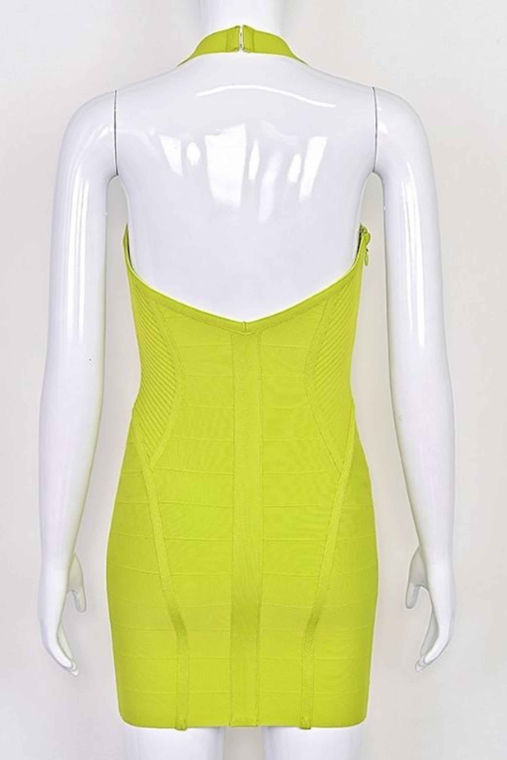 Woman wearing a figure flattering Isabella Bandage Mini Dress - Neon Green BODYCON COLLECTION Pty Ltd