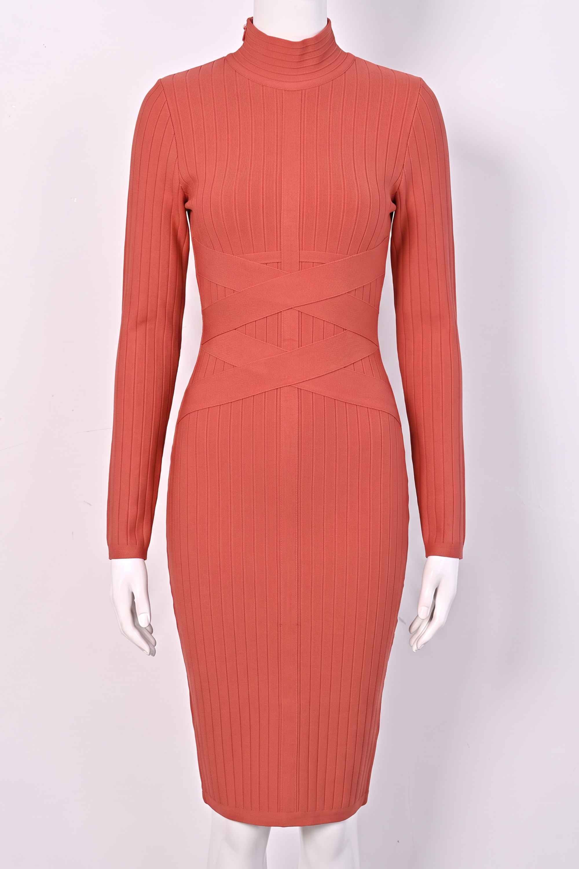 Woman wearing a figure flattering Jane Long Sleeve Bodycon Midi Dress - Lipstick Red Bodycon Collection