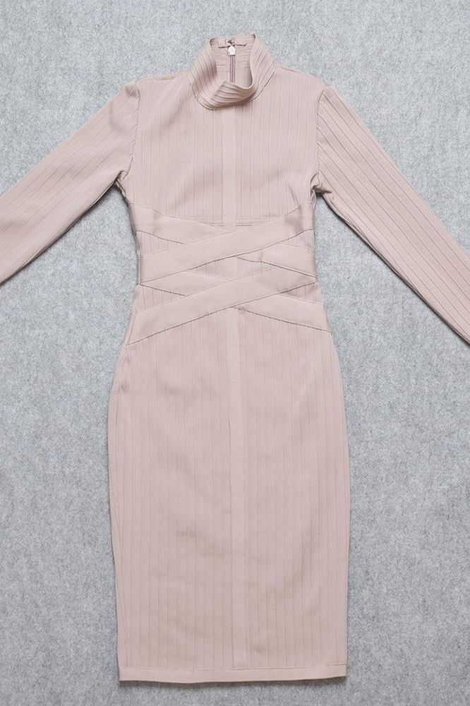 Woman wearing a figure flattering Jane Long Sleeve Bodycon Midi Dress - Nude Bodycon Collection