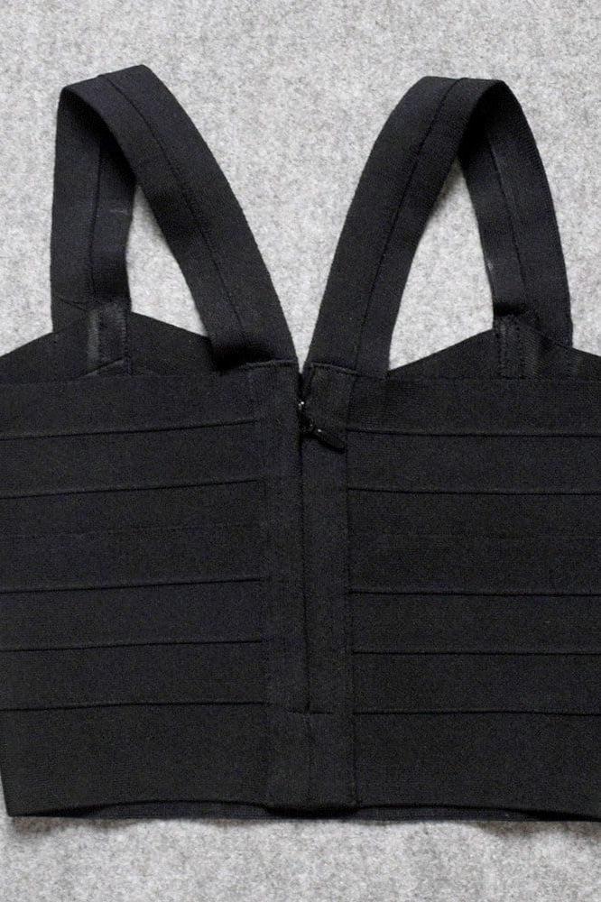 Woman wearing a figure flattering Jay Bandage Crop Top - Classic Black BODYCON COLLECTION