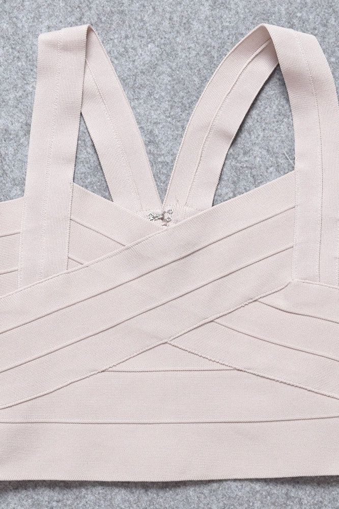 Woman wearing a figure flattering Jay Bandage Crop Top - Cream BODYCON COLLECTION