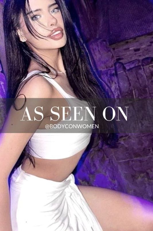 Woman wearing a figure flattering Jay Bandage Crop Top - Cream BODYCON COLLECTION