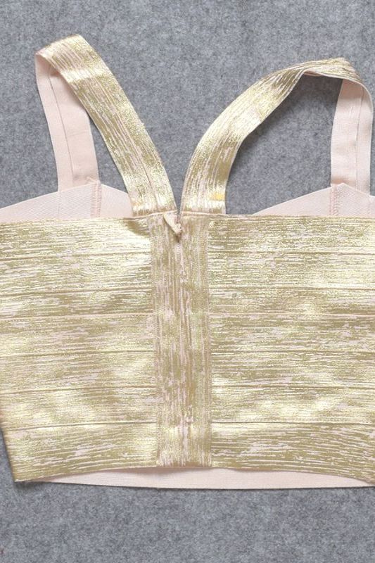 Woman wearing a figure flattering Jay Bandage Crop Top - Gold BODYCON COLLECTION