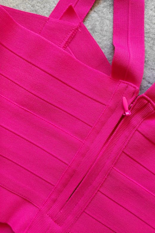 Woman wearing a figure flattering Jay Bandage Crop Top - Hot Pink BODYCON COLLECTION