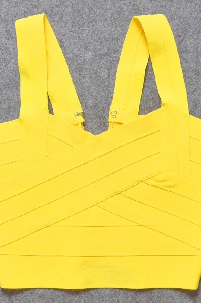 Woman wearing a figure flattering Jay Bandage Crop Top - Sun Yellow BODYCON COLLECTION