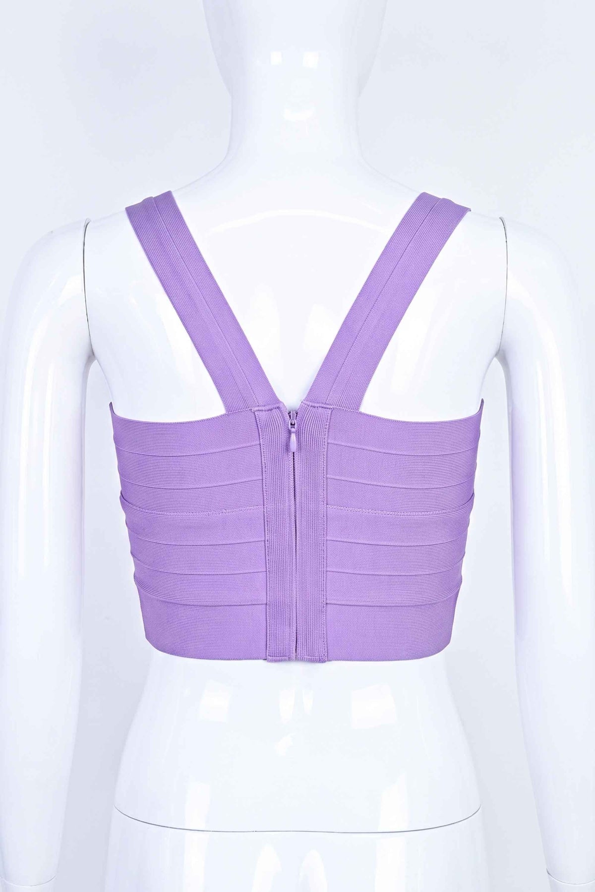 Woman wearing a figure flattering Jay Bandage Crop Top - Violet Purple BODYCON COLLECTION