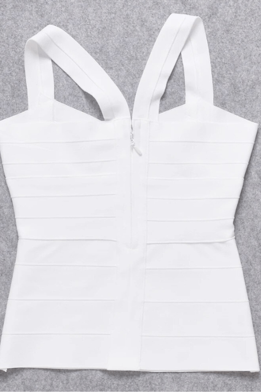Woman wearing a figure flattering Jay Bandage Top - Pearl White BODYCON COLLECTION