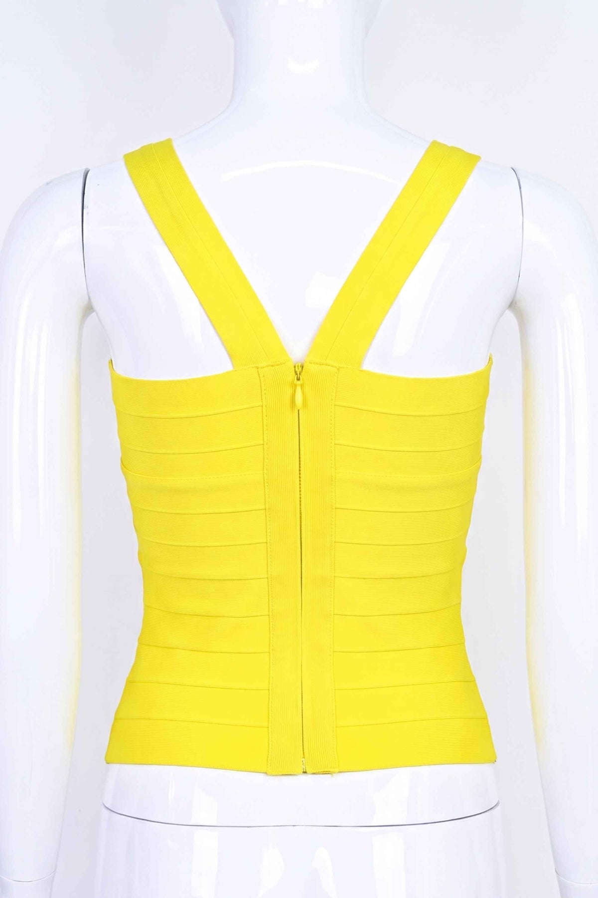 Woman wearing a figure flattering Jay Bandage Top - Sun Yellow BODYCON COLLECTION