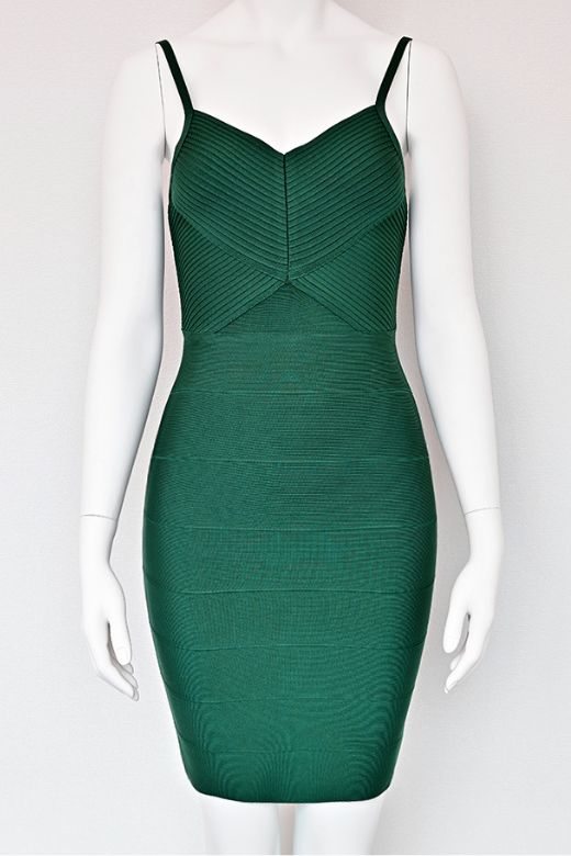 Woman wearing a figure flattering Jene Bandage Dress - Emerald Green BODYCON COLLECTION