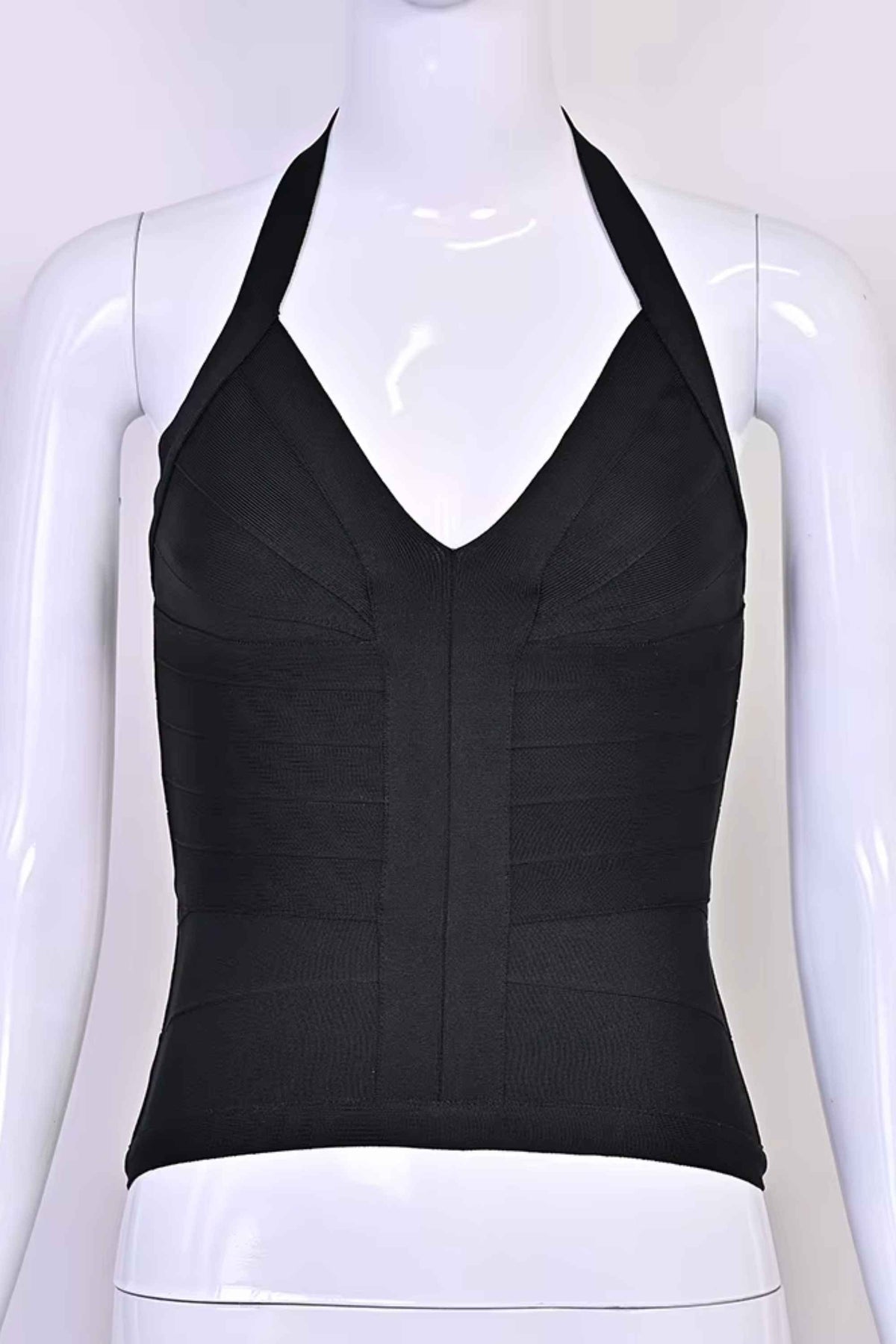 Woman wearing a figure flattering Jenna Bandage Top - Classic Black BODYCON COLLECTION Pty Ltd