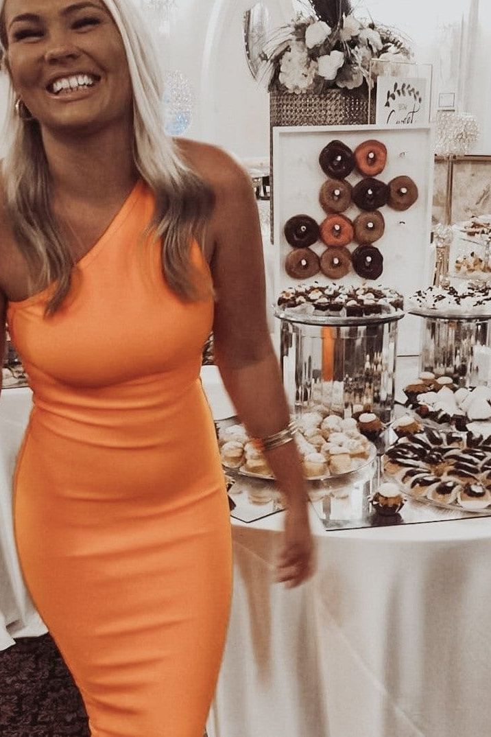 Woman wearing a figure flattering Joi Bodycon Midi Dress - Pearl White Bodycon Collection