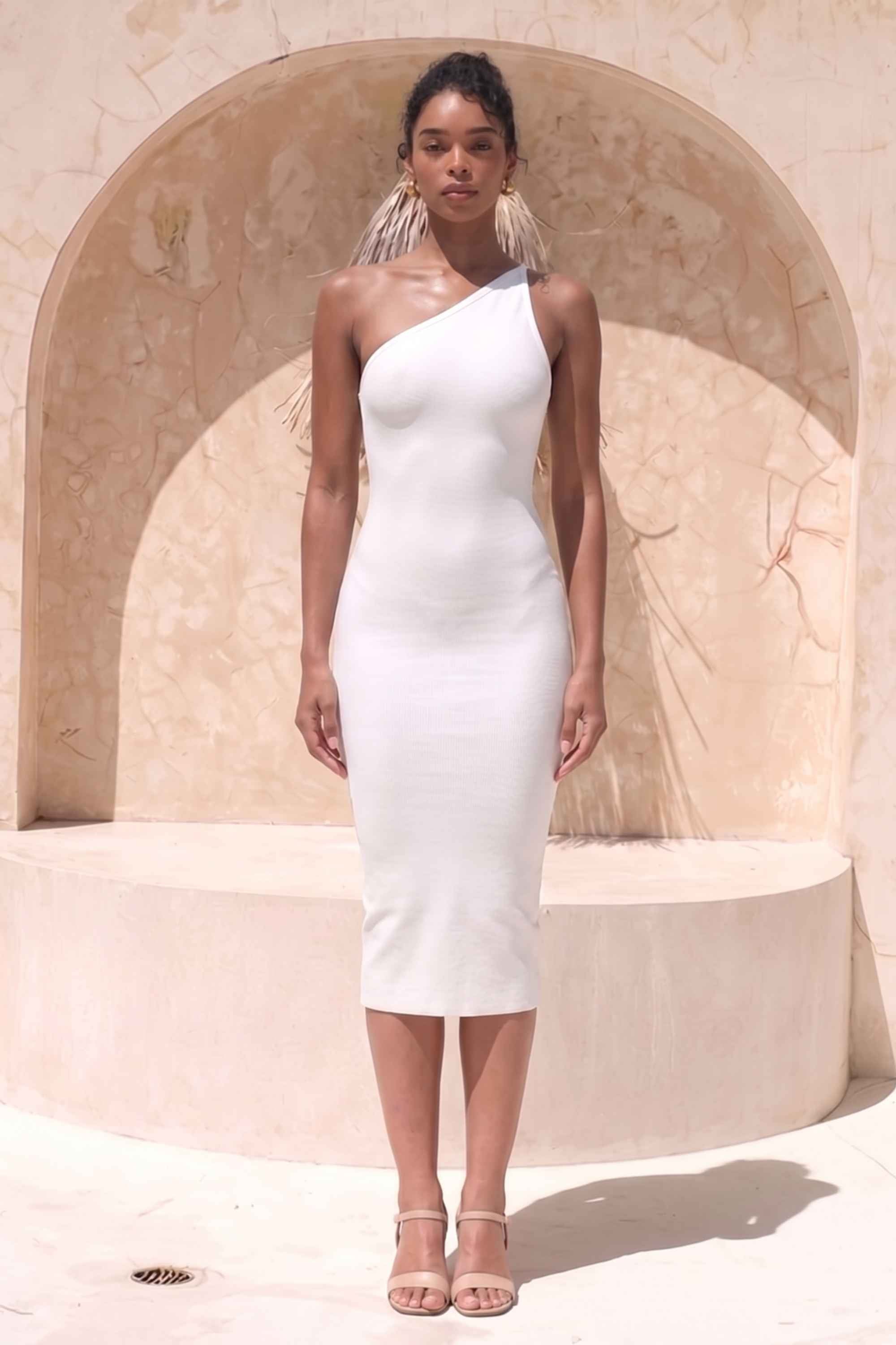 Woman wearing a figure flattering Joi Bodycon Midi Dress - Pearl White Bodycon Collection