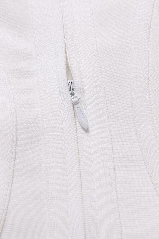 Woman wearing a figure flattering Joy Bandage Midi Dress - Pearl White Bodycon Collection