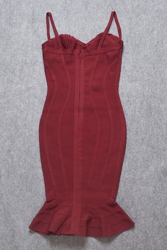 Woman wearing a figure flattering Joy Bandage Midi Dress - Red Wine Bodycon Collection
