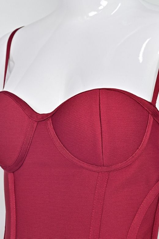 Woman wearing a figure flattering Joy Bandage Midi Dress - Red Wine Bodycon Collection