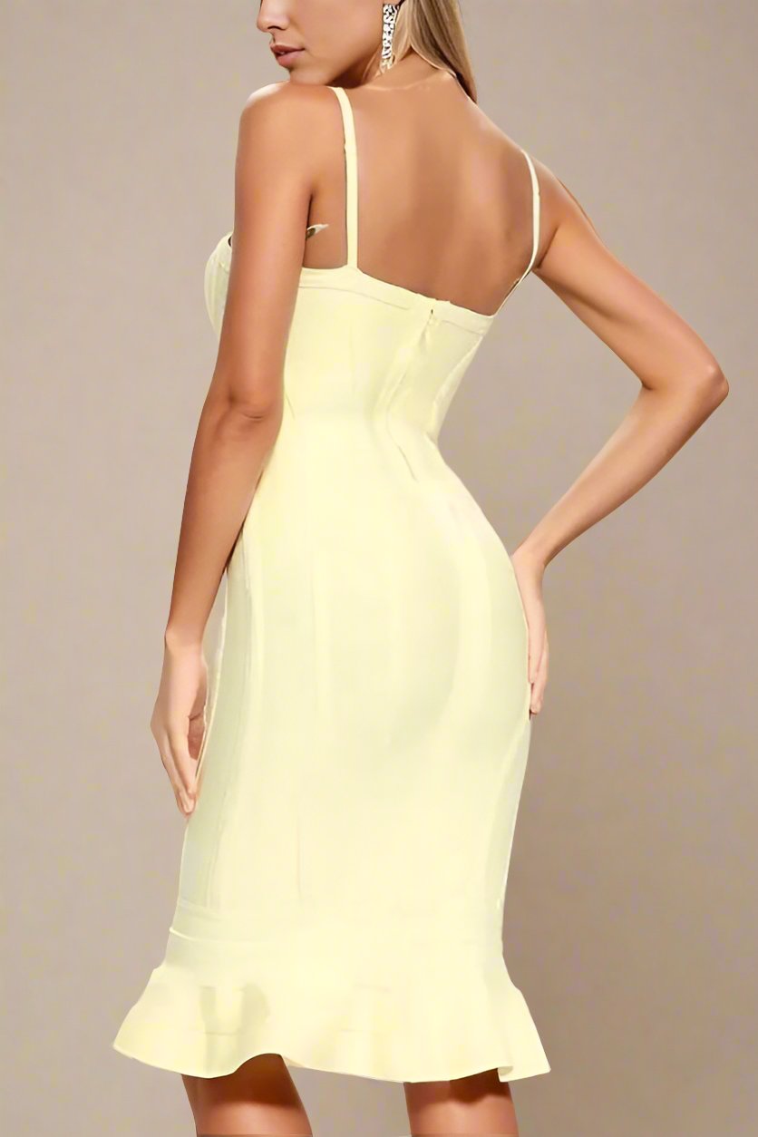 Woman wearing a figure flattering Joy Bandage Midi Dress - Sun Yellow Bodycon Collection