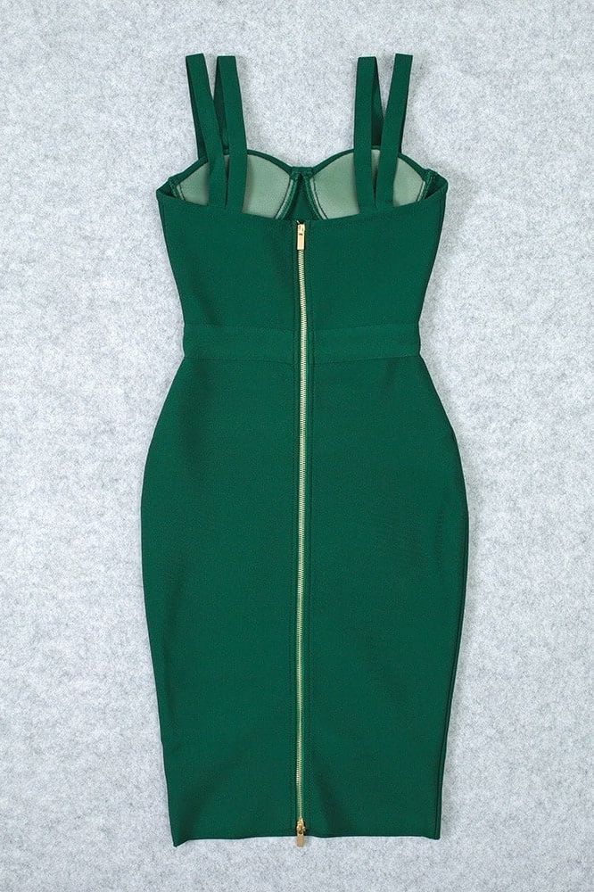 Woman wearing a figure flattering  Kate Bandage Dress - Emerald Green Bodycon Collection