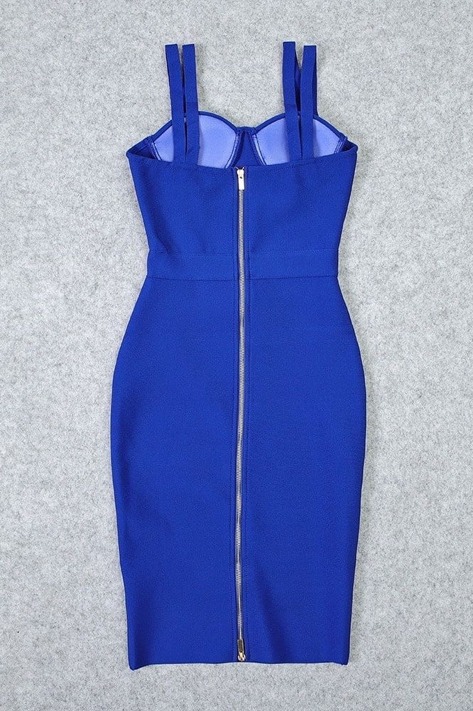 Woman wearing a figure flattering Kate Bandage Dress - Royal Blue Bodycon Collection